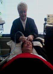 Karen using Professional Crystal Microdermabrasion on longtime KARAMAR Client - Dr. John H. - MD